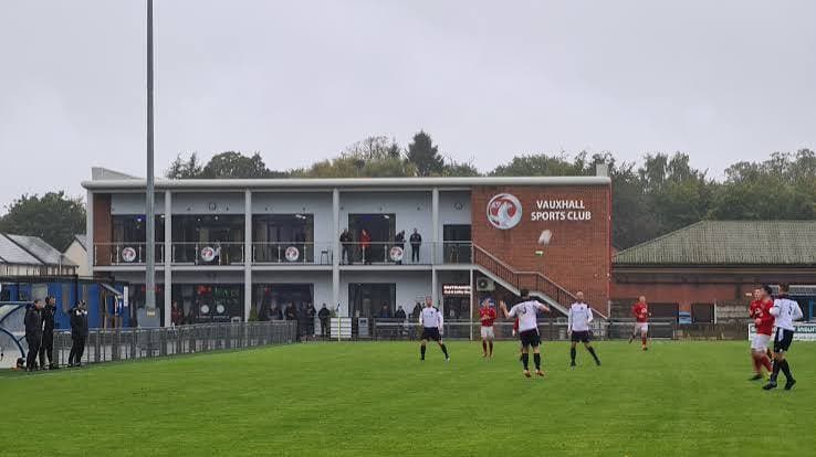 A match under way in front of the clubhouse at Vauxhall Sports Club in the Liverpool area.