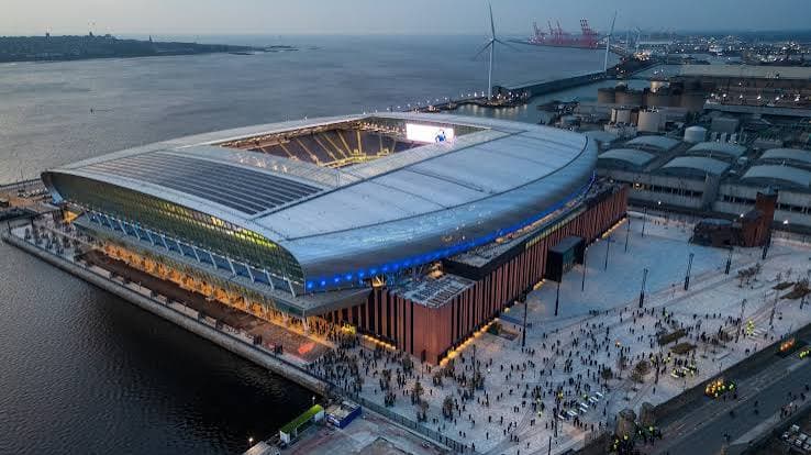 Aerial view of Hill Dickinson Stadium, Everton’s new home on the Liverpool waterfront, at dusk.