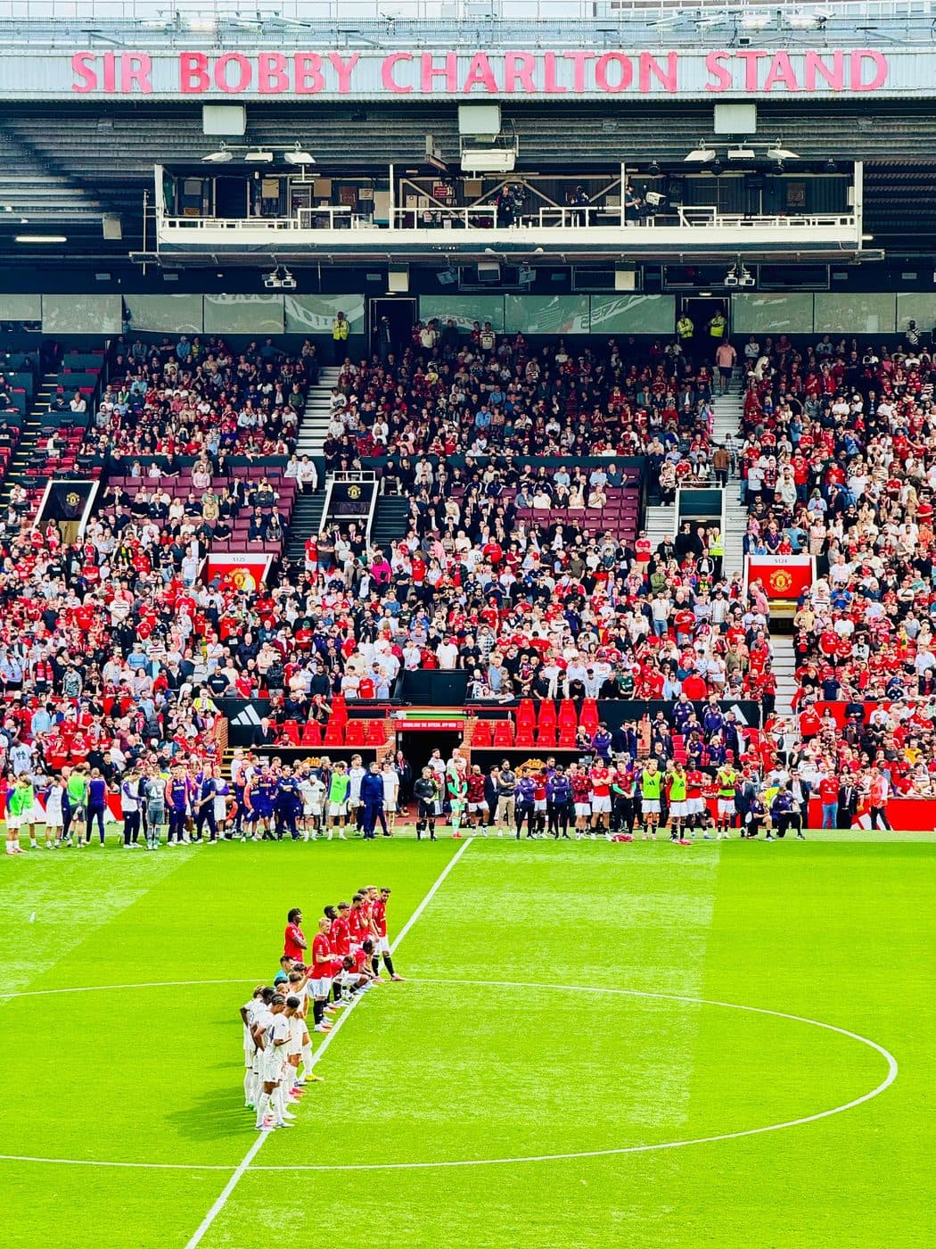 A packed English stadium crowd on a matchday during an IPPE soccer tour